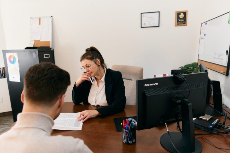 Two people negotiating in an office
